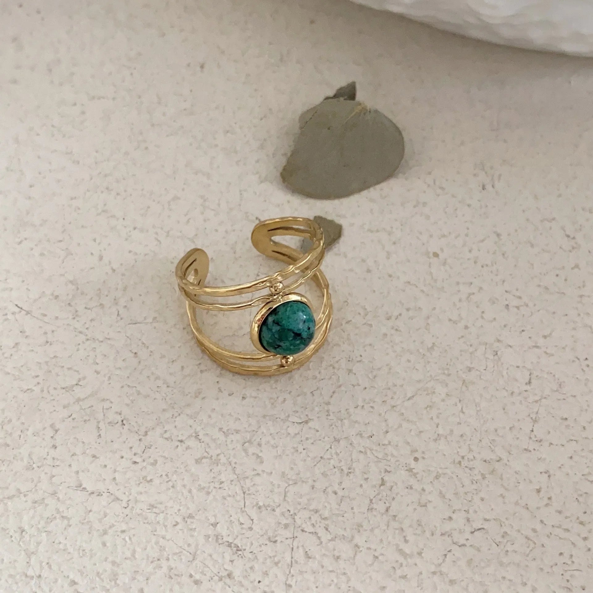 Geometric open ring with green natural stone centrepiece and titanium steel electroplated alloy band