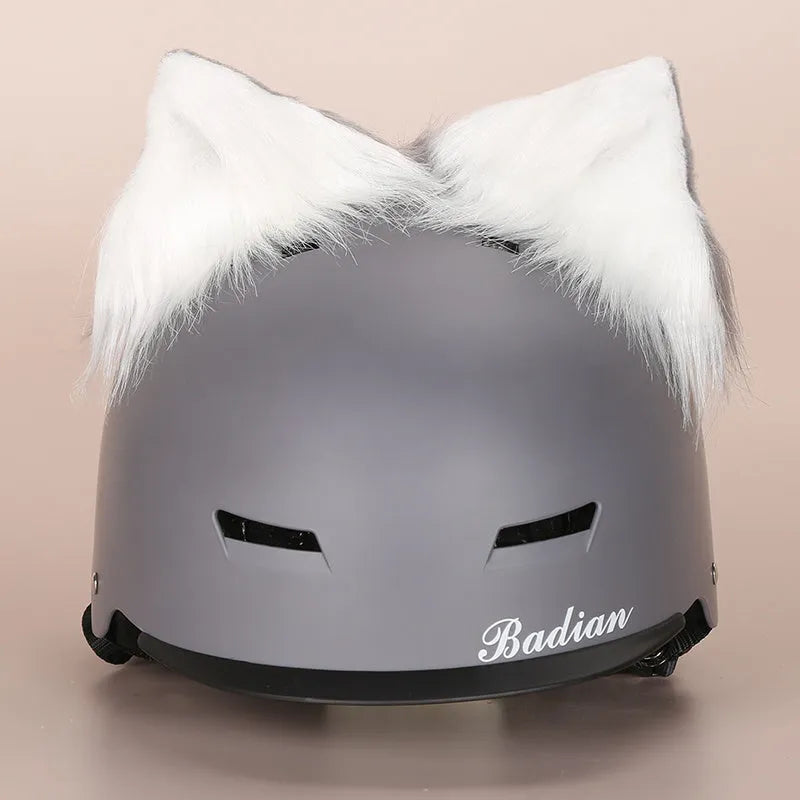Soft plush cartoon character hat topper decoration for a ski helmet.
