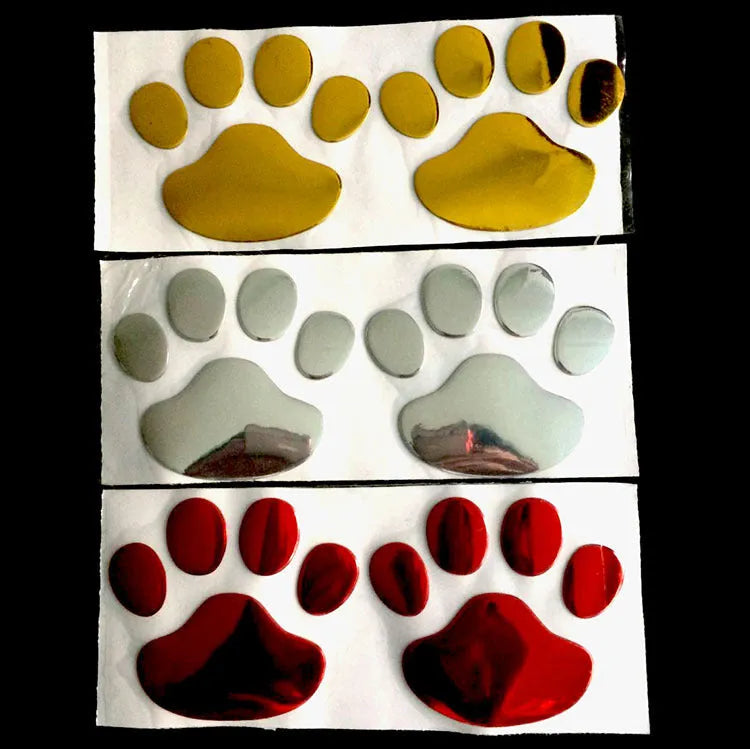 PVC car sticker pair featuring hand-shaped brush dog footprints design in choice of colours