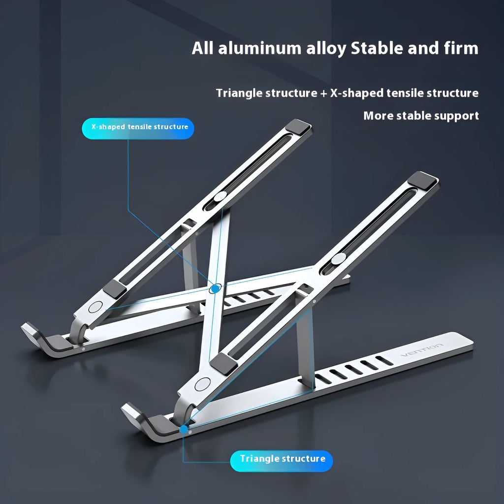 Silver aluminium alloy adjustable laptop stand on a desk with a notebook on top