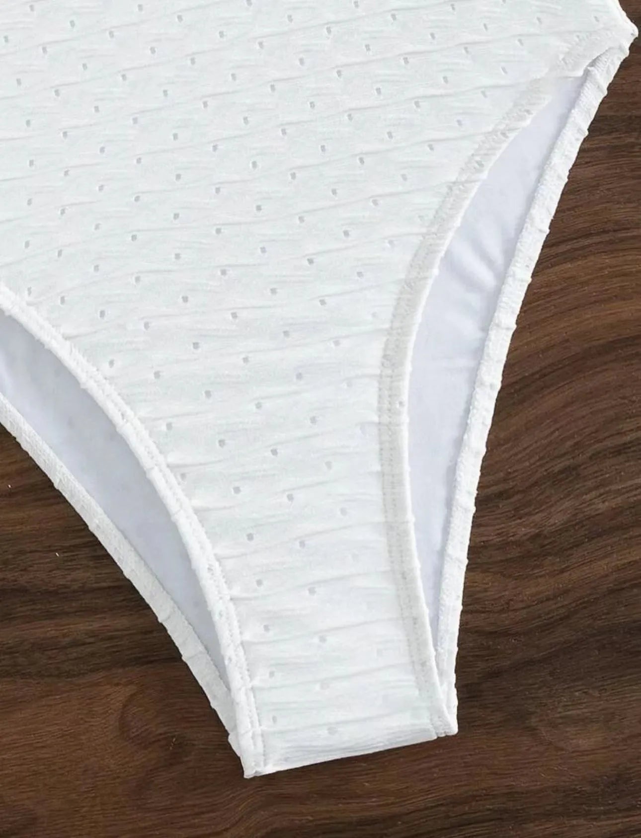 White polyester one-piece swimsuit for women with briefs style and sling design