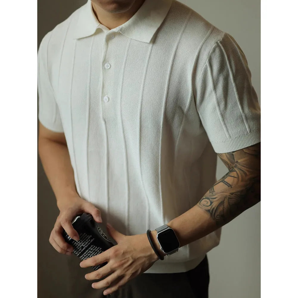 Men's loose fit solid colour polyester T-shirt on a hanger, shown in black and white colour options.