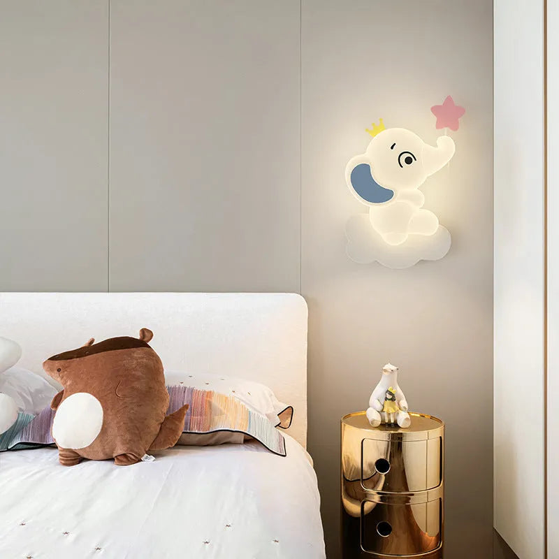 White cartoon elephant wall light with tricolour dimming, 22cm balloon elephant design, on a wall in a child's room