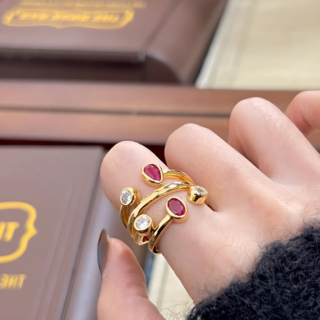 Double-headed diamond ring with irregular cross geometric shape in two-tone colours