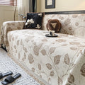 Chenille sofa cover with retro floral pattern in Beige, 180cm wide, draped over a sofa