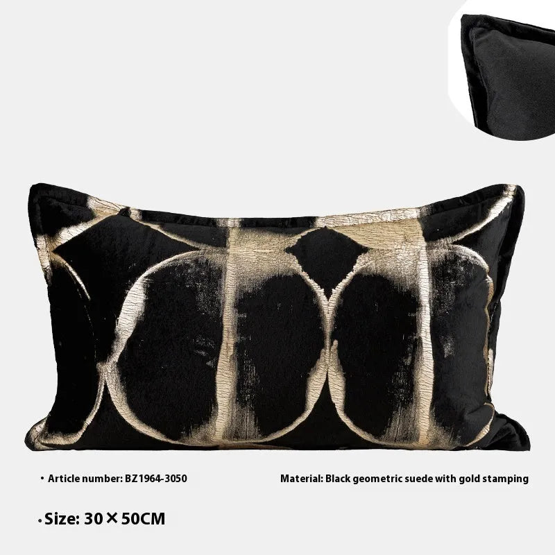 Black gold abstract pattern decorative cushion with removable cover in 45x45cm square size on a grey sofa.