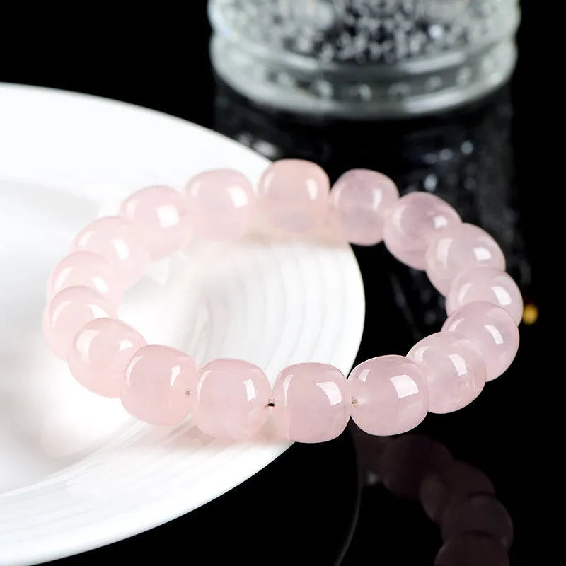 Pink crystal barrel bead bracelet with geometric design, 11-12mm beads, unisex accessory