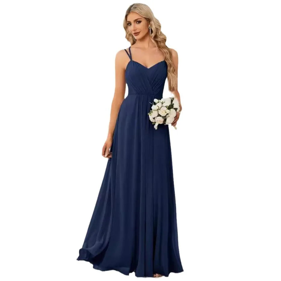 Women's sleeveless sling neck pleated dress in light green with A-line skirt for banquet events