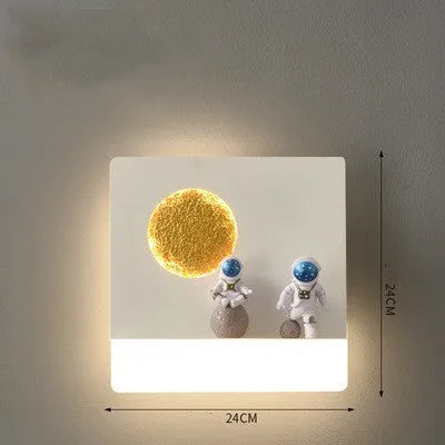 Astronaut-shaped wall lamp with a small shelf, shown in a choice of round or square, black or white finishes.