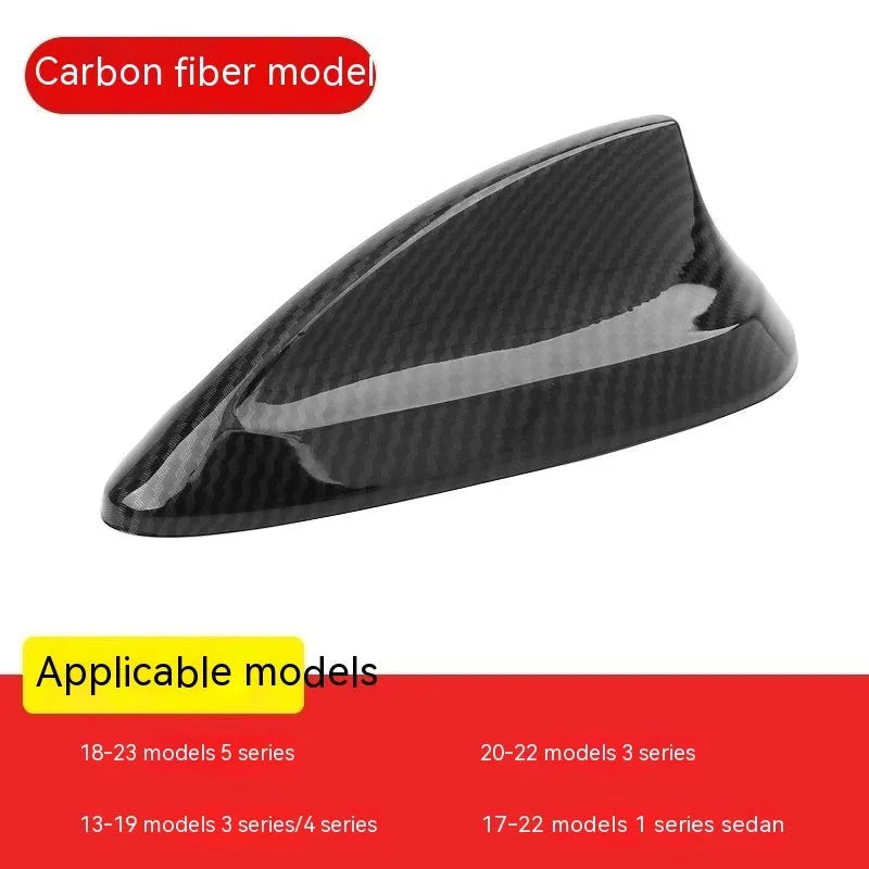 BMW shark fin antenna cover replacement in carbon fibre pattern and piano black finish options.