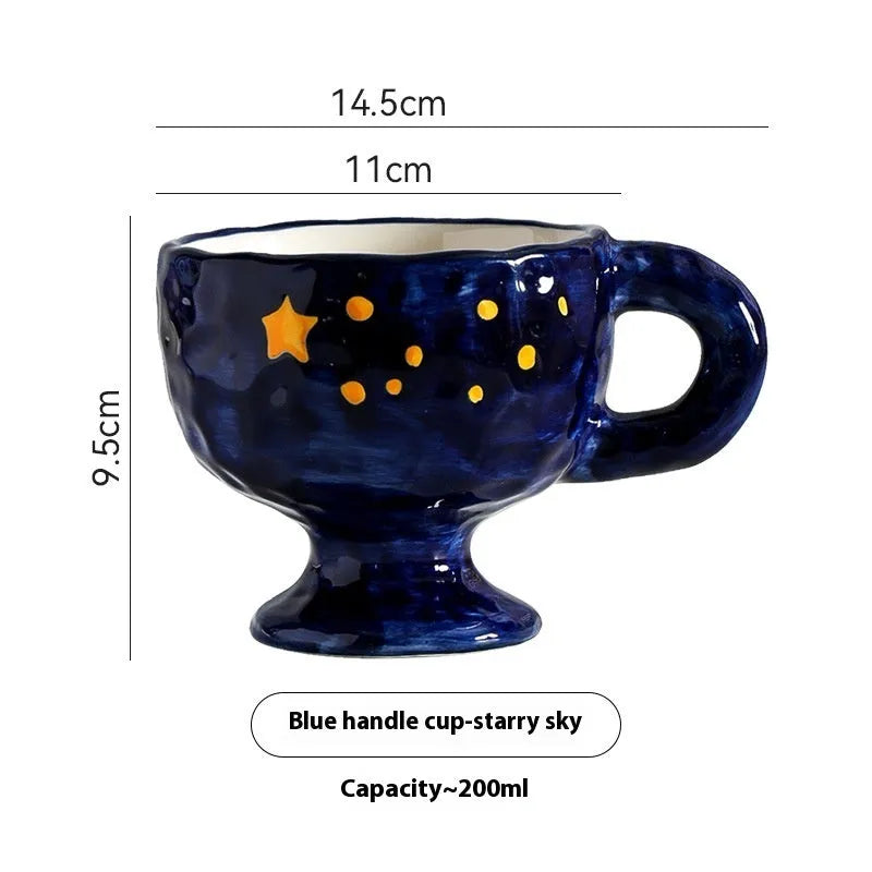 Hand-pinched irregular ceramic mug in a solid colour, showing its unique shape.