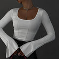 White square-neck fitted long-sleeve knit top with flared sleeves and 3D pattern on a model