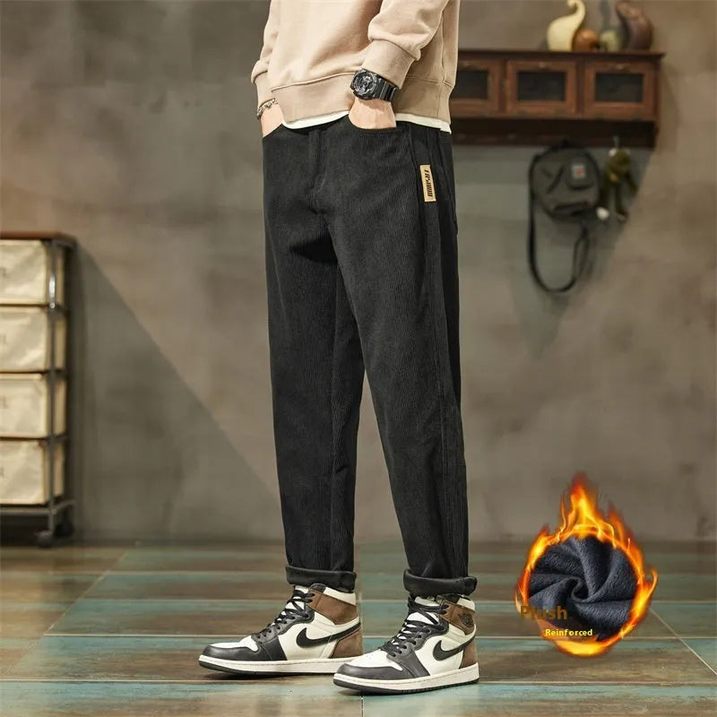 Corduroy men's casual trousers in street fashion style with straight leg opening and tapered cut