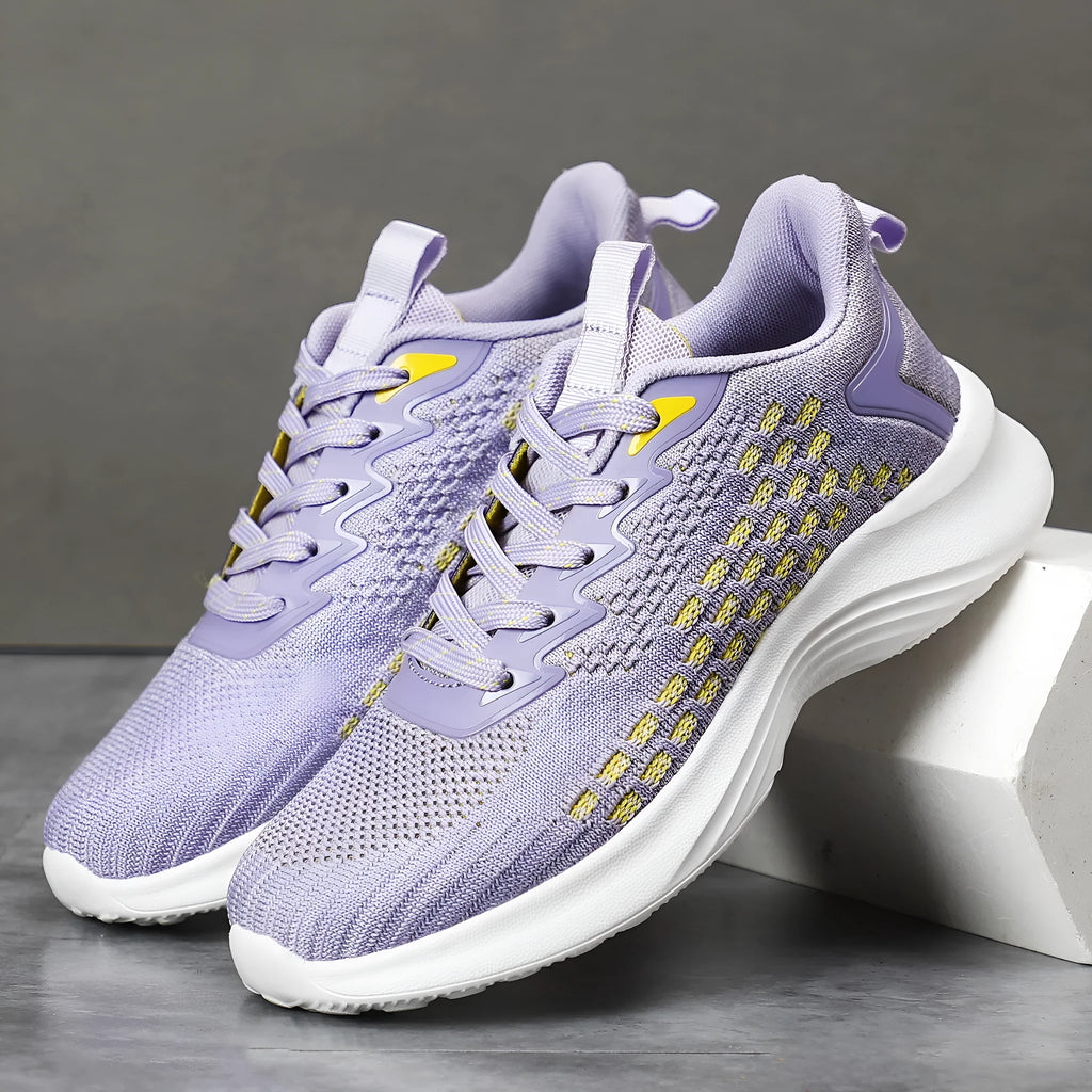 Lavender purple women's Flyknit running shoes with mesh upper and striped pattern on an EVA sole.