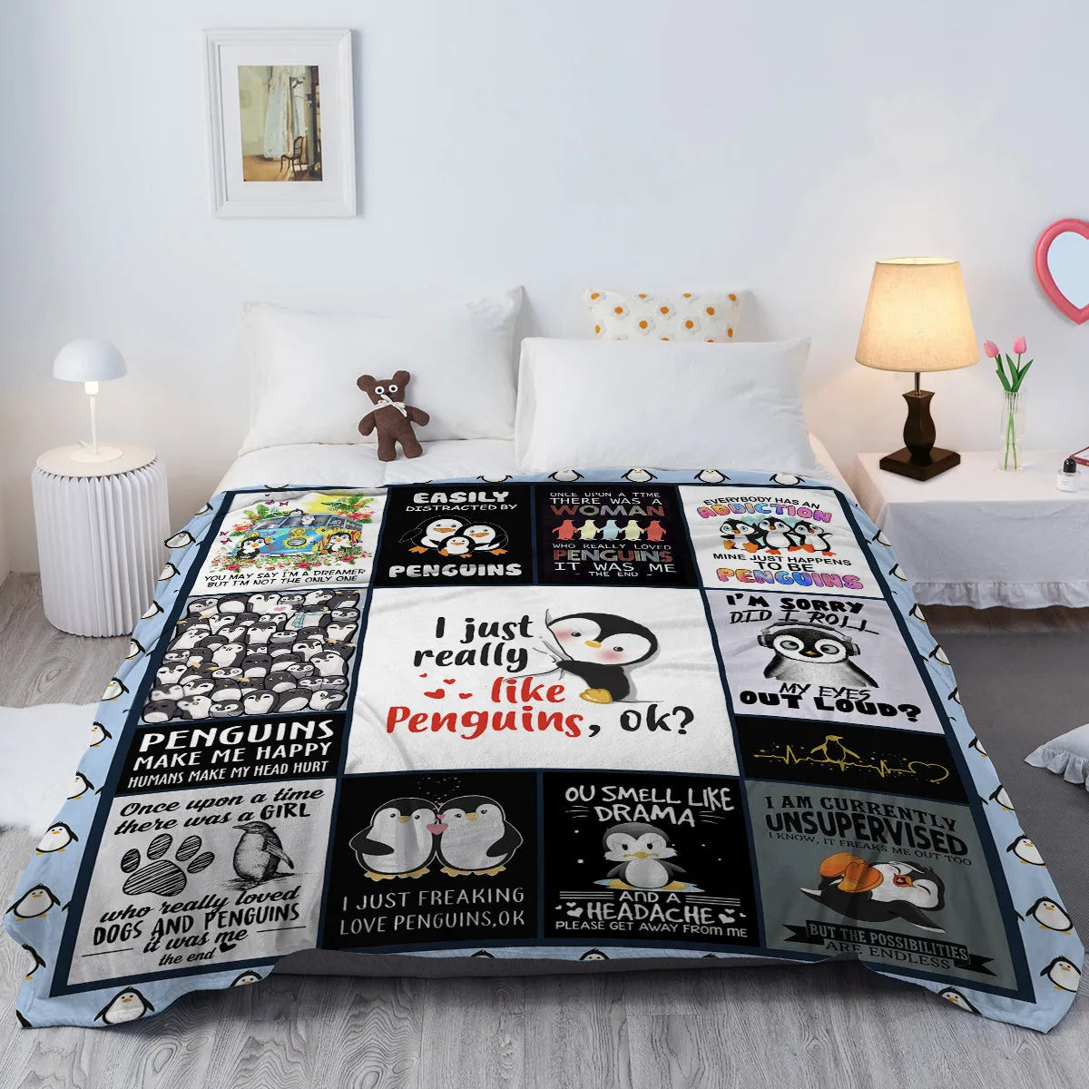Multicolored flannel velvet blanket with penguin patterns, 130x150cm, on a sofa