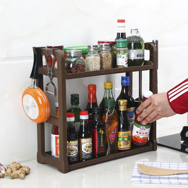 Foldable pink PP kitchen storage shelving unit with multiple tiers for organisation.