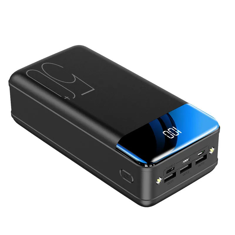 Black and white 50000mAh power bank showing three USB output ports and compact design