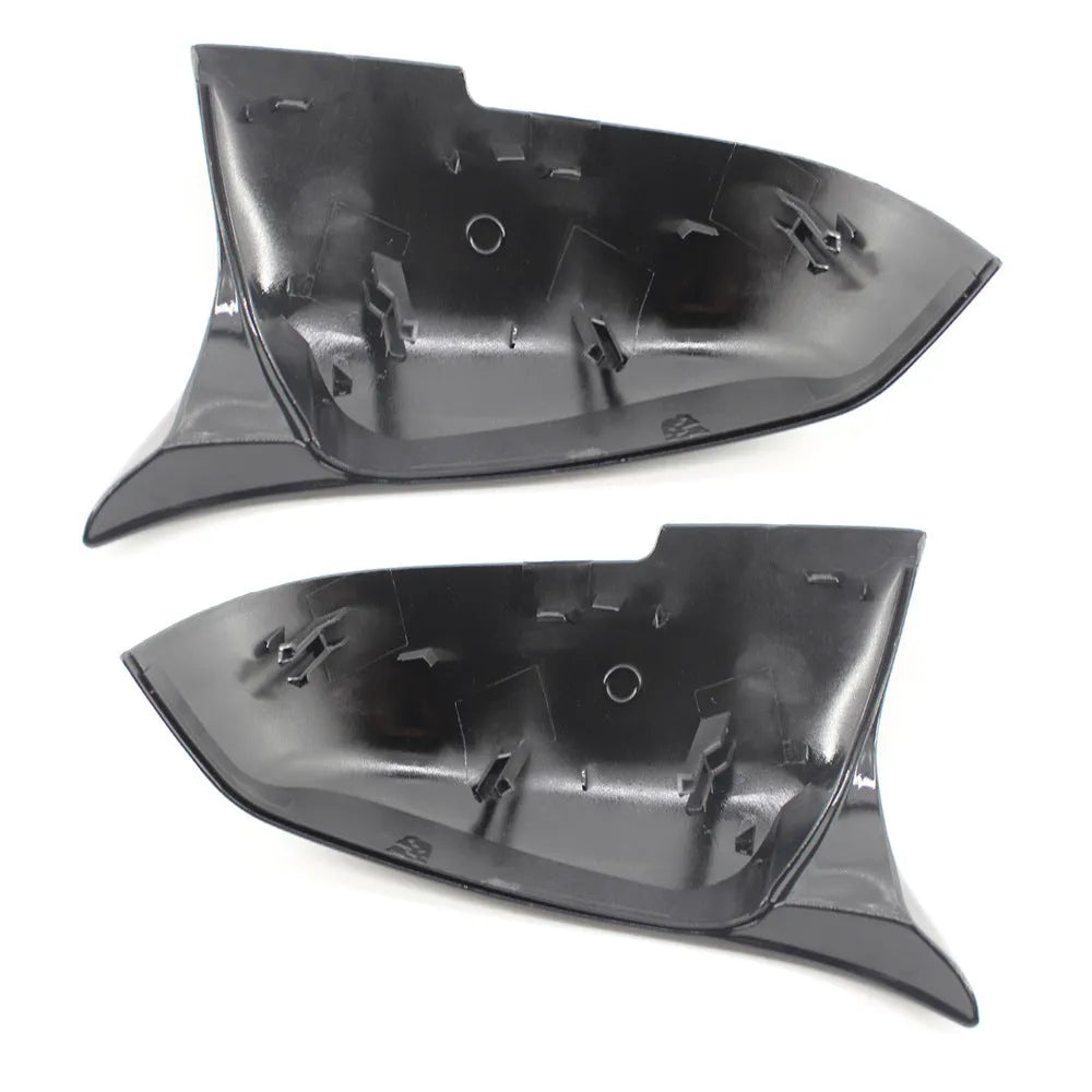 Pair of paint bright black horn-style BMW rearview mirror shells for F30 3 Series.