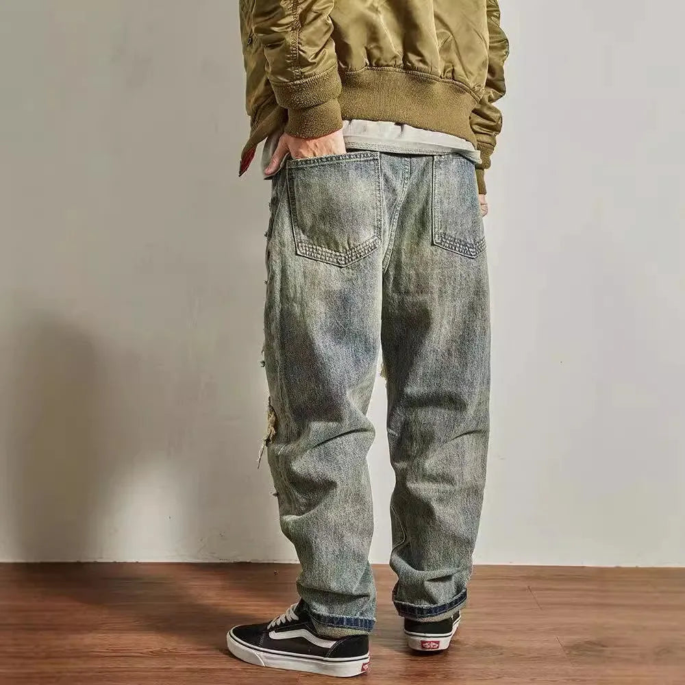 Men's loose straight tapered distressed broken holes jeans in light blue cotton, mid-waist, size 30