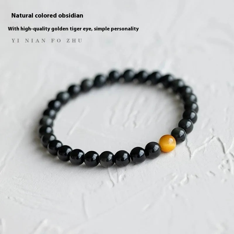 Black geometric obsidian bead bracelet shown in three size options: 6mm, 8mm, and 10mm beads.