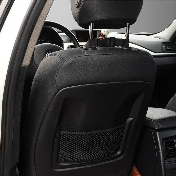 Memory foam car lumbar support cushion in grey colour on a car seat