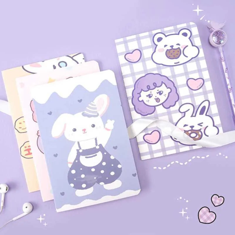 Cartoon A5 notebook with 30 sheets showing character designs including Strawberry Rabbit and Cute Bear