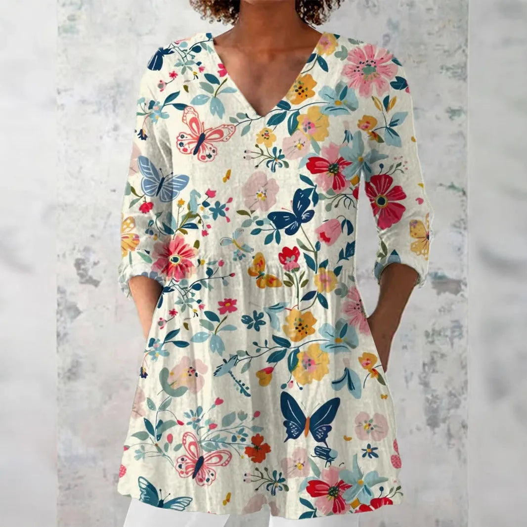 Women's retro-style slim fit long-sleeved top with a printed pattern, shown in a colour option.