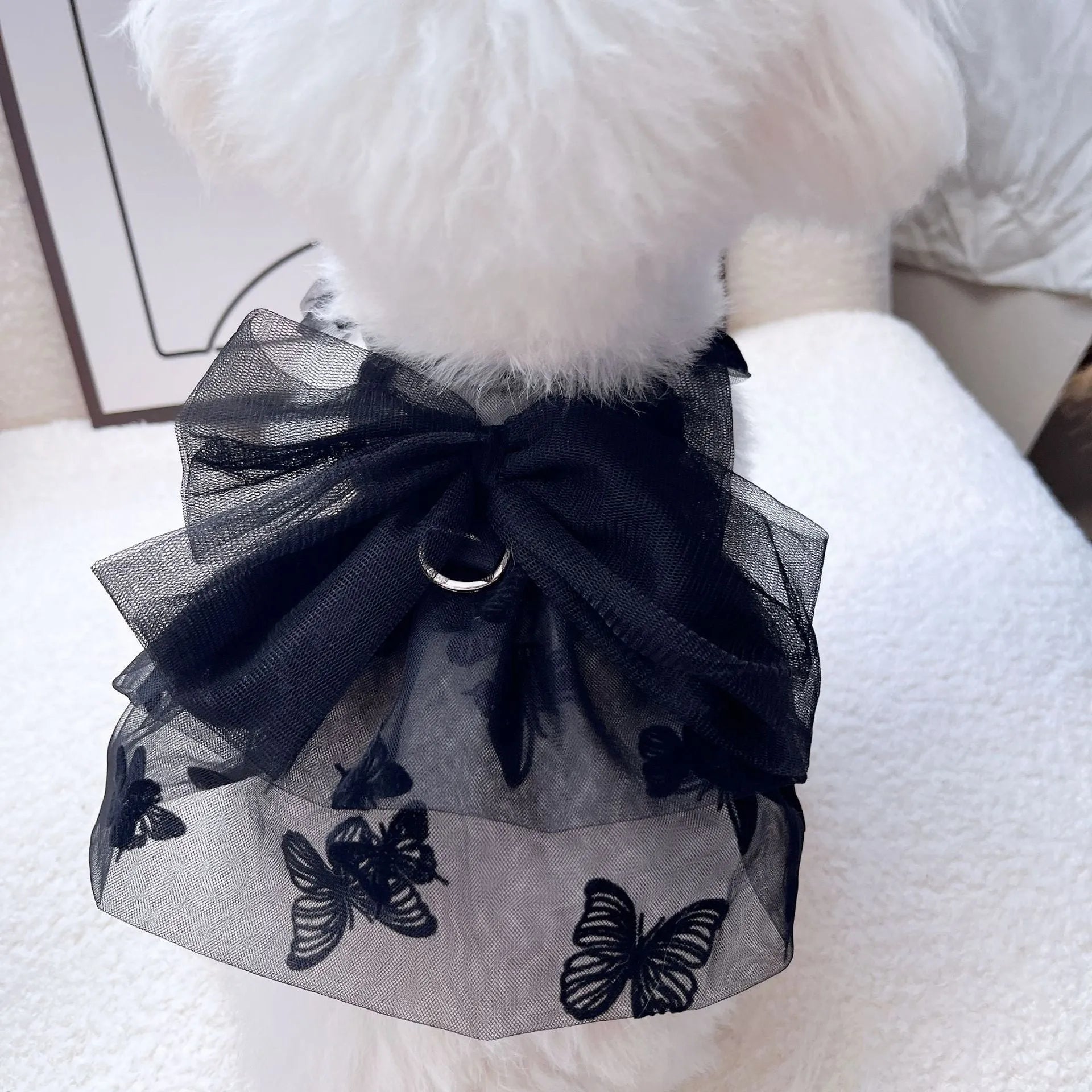 Black tulle princess skirt costume for a small dog on a mannequin.