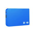 Silver portable solid state drive with USB cable and cover on a desk.