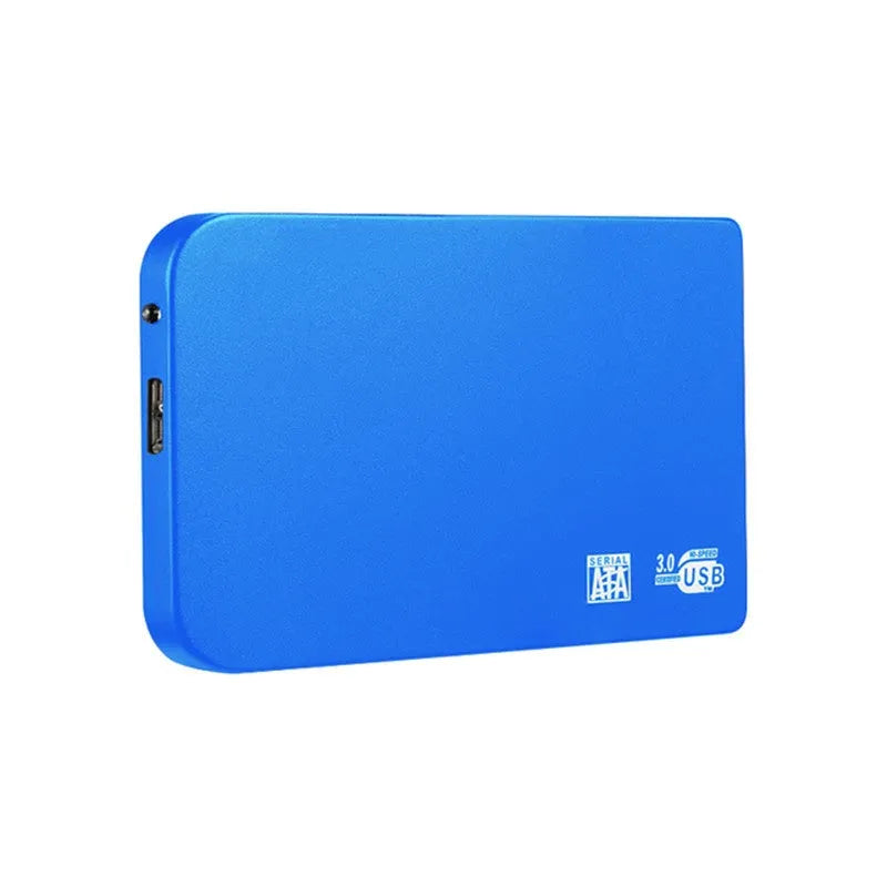 Silver portable solid state drive with USB cable and cover on a desk.