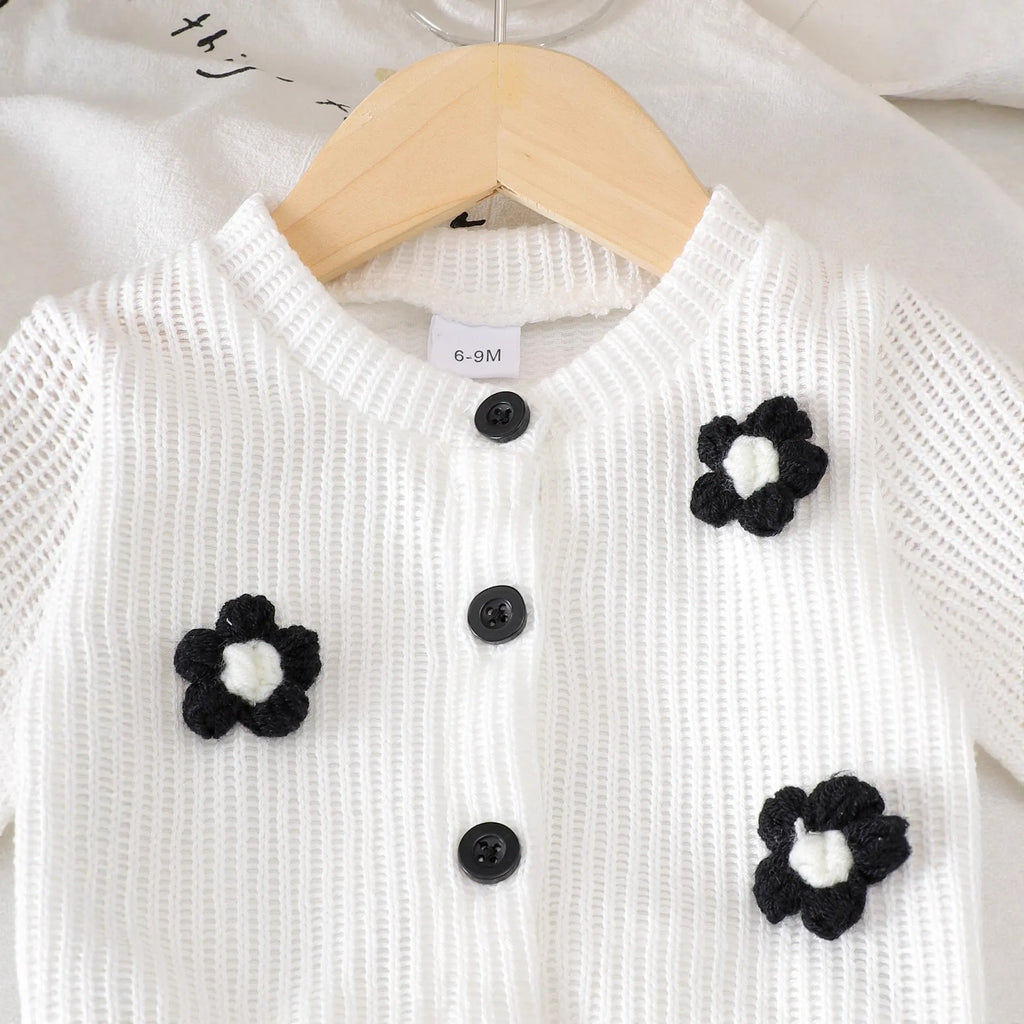 White floral long sleeve top and black trousers baby outfit set in cotton, sizes 6-9M to 2-3Y