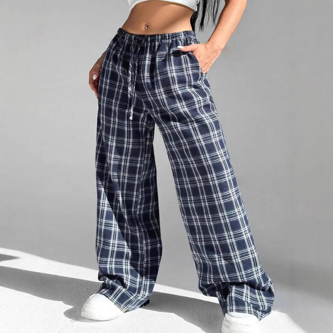 Women's plaid pattern casual trousers with loose fit, drawstring waist, and functional pockets