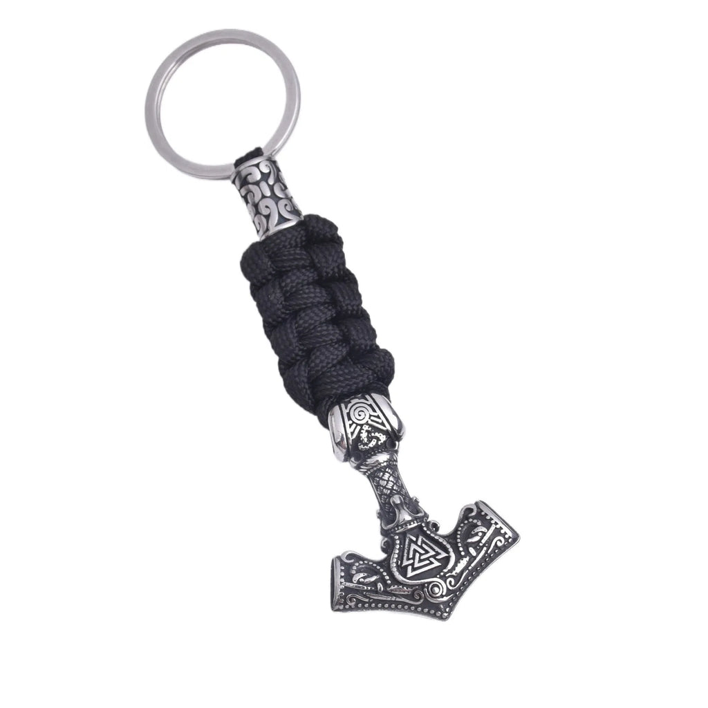 Viking triangle rune impactor keychain in stainless steel with animal motif, available in three metal finishes