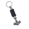 Viking triangle rune impactor keychain in stainless steel with animal motif, available in three metal finishes