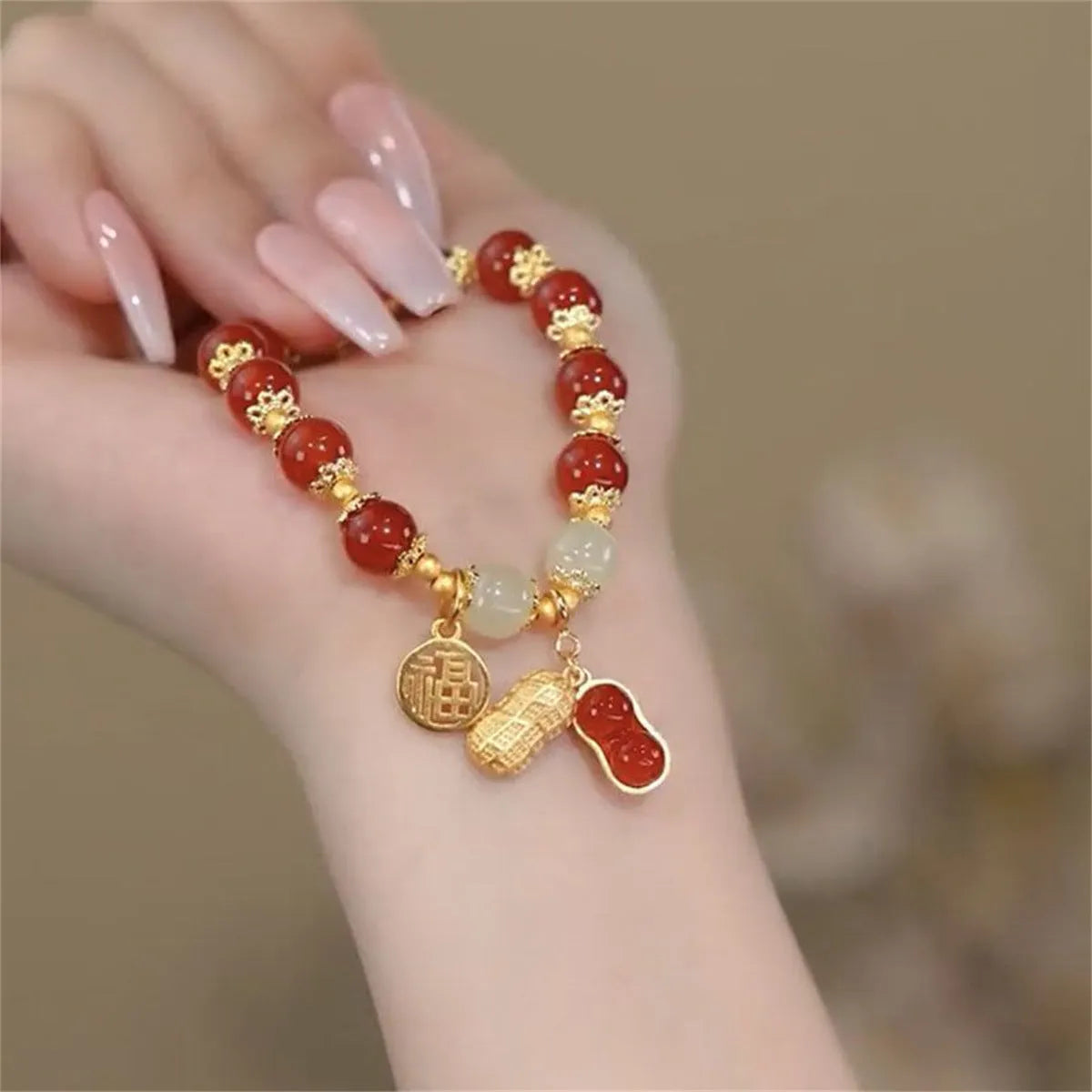 National style glass bracelet with rabbit charm and coloured glaze decoration