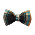 Retro green four-piece dog set showing collar, leash, vest, and decorative bow on a white background.