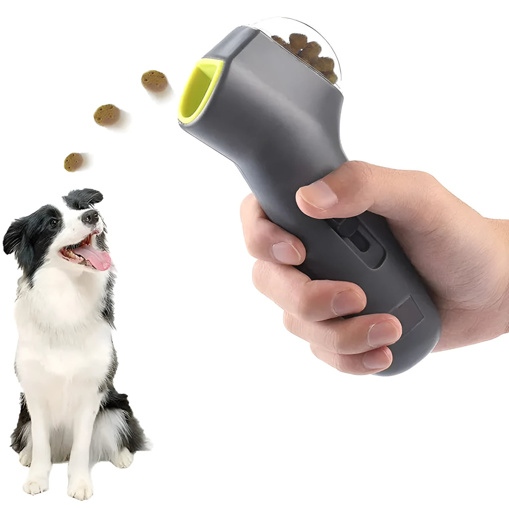 Grey plastic pet snack catapult launcher toy with a handle for dog and cat interactive training.