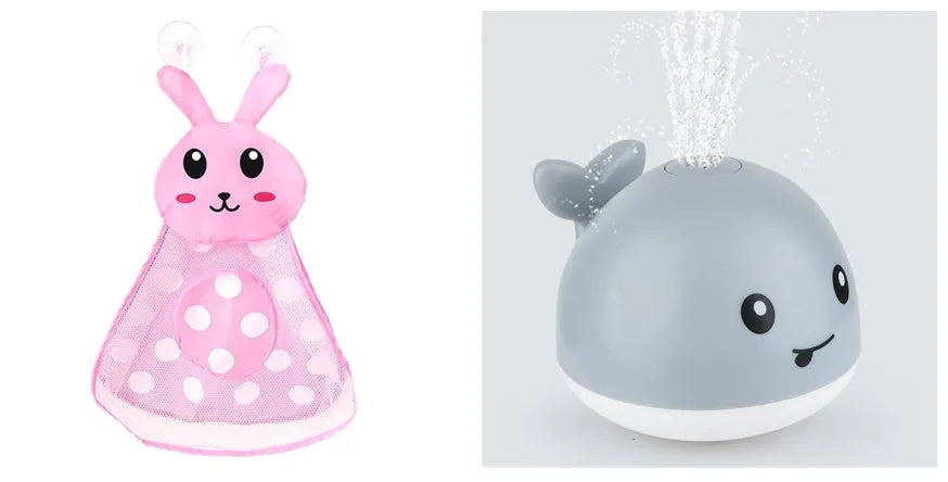 Whale-shaped electric bath toy spraying water with flashing lights, floating in baby bathtub