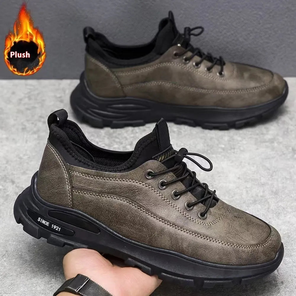 Men's black fleece-lined waterproof sneakers with a round toe and low-top design on a rubber sole.