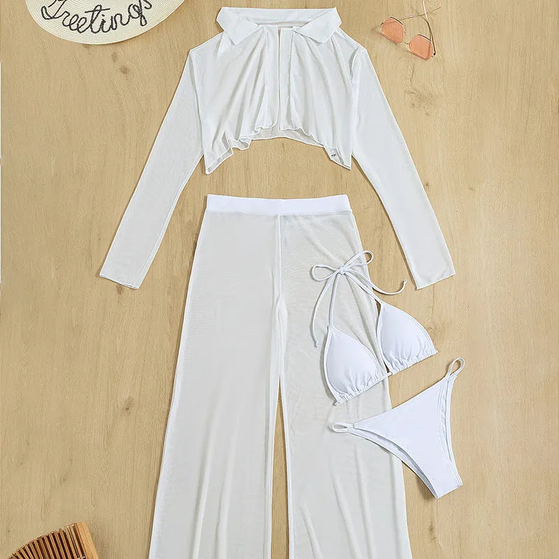 White women's swimwear four-piece set with high-waisted bottoms and backless top on a mannequin