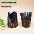 Traditional white buffalo horn comb with wide teeth and pointed tips for meridian massage