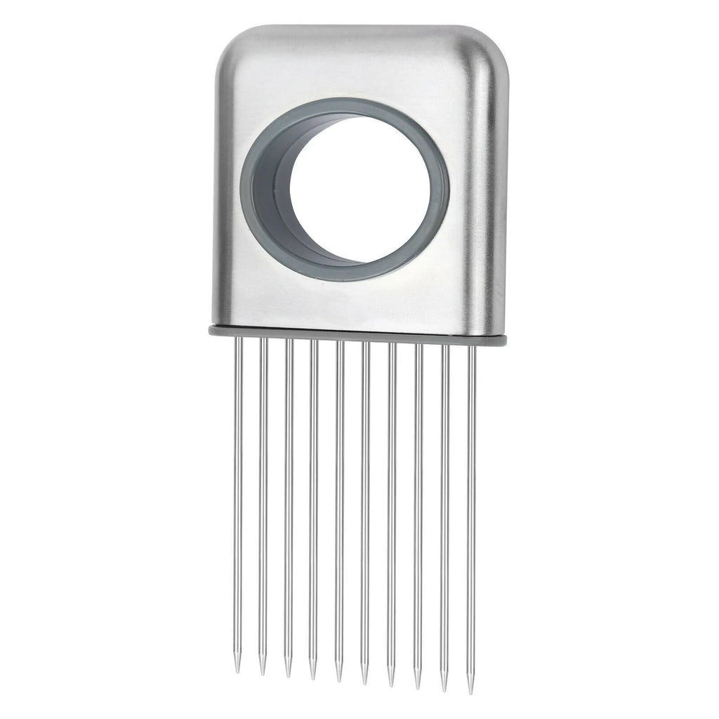 Stainless steel onion holder with sharp prongs and a red finger guard on a kitchen counter.