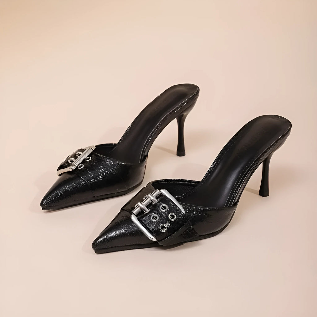 Black women's high heels with pointed toe and buckle strap detail in PU material