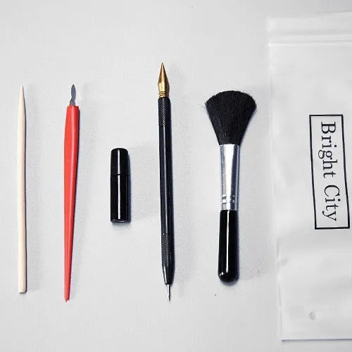 Scratch painting tools set with healing pen model and 14.5 cm long scraping implements on white card paper