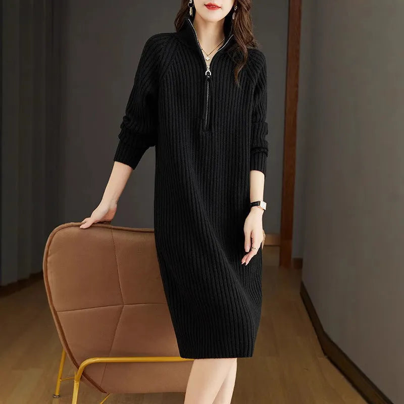 Beige woolen skirt with half zipper front, stand collar and loose long sleeves in straight dress silhouette