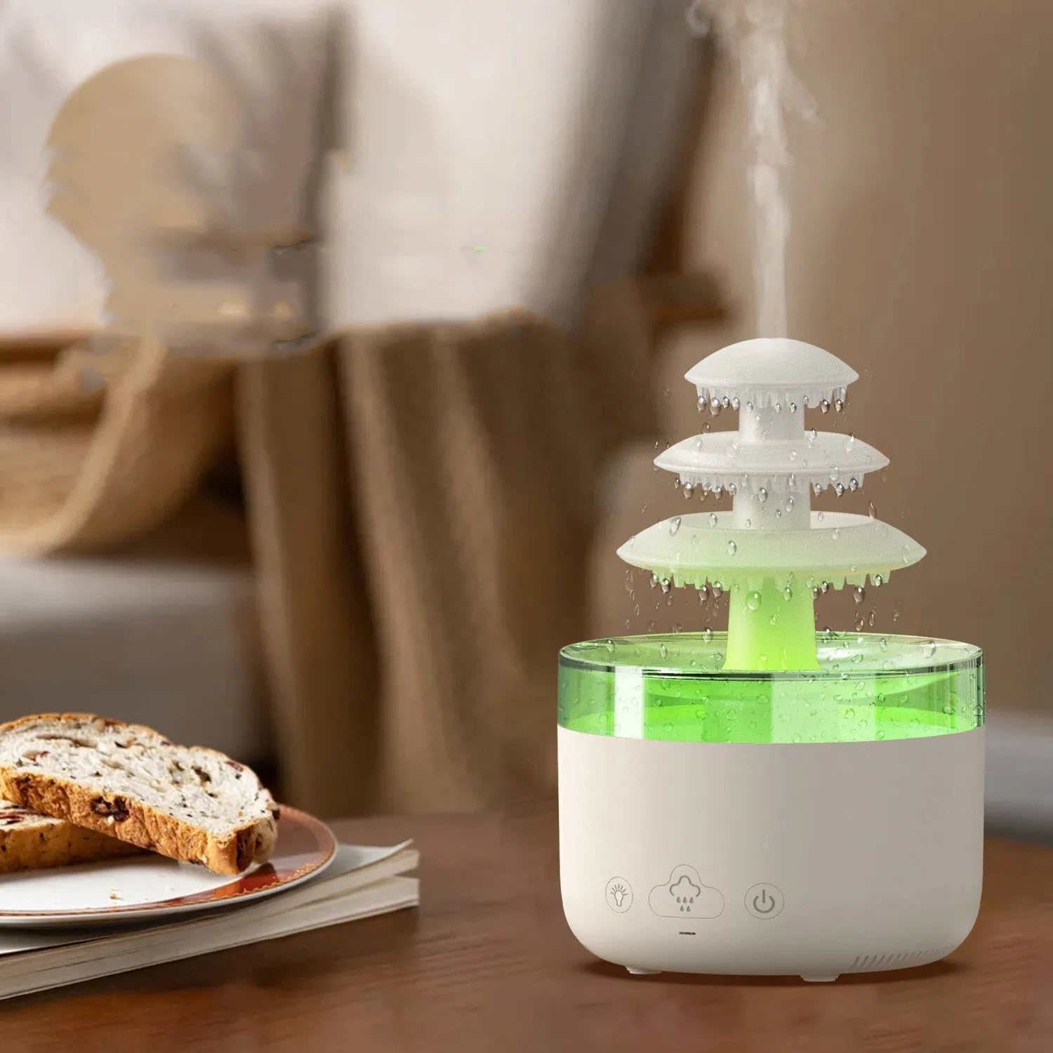 White plastic cloud rain effect USB air humidifier and essential oil diffuser with coloured lights.
