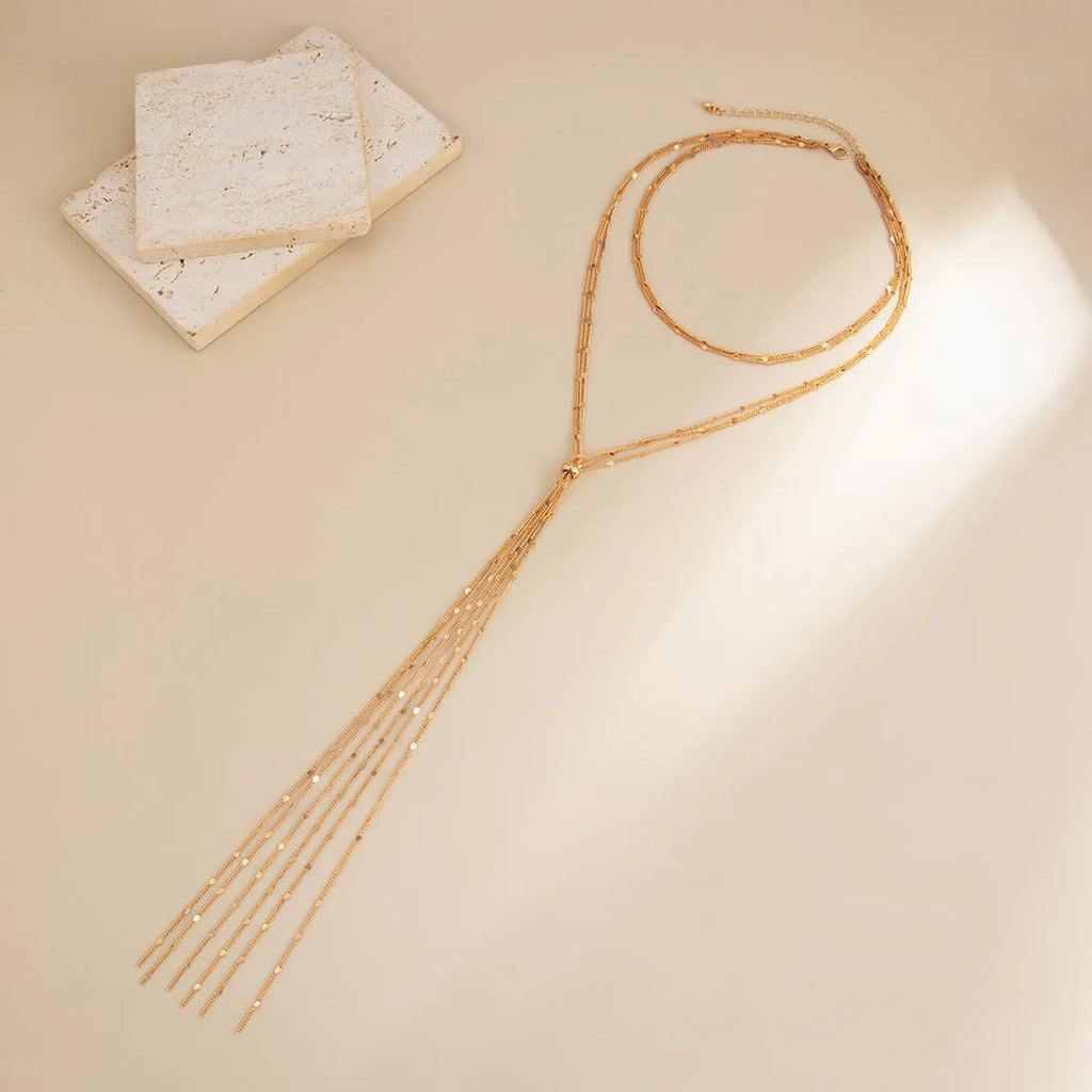 Women's Y-shaped tassel neck back chain in gold 7458 with copper geometric pendant and multi-layer chain