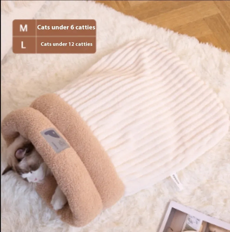 Brown semi-enclosed cat sleeping bag with lambswool lining on wooden floor