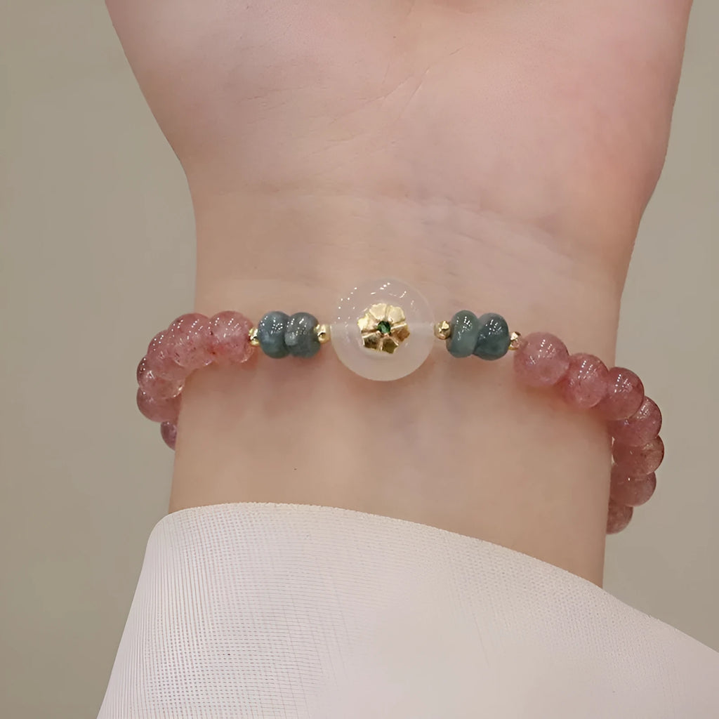Women's strawberry quartz bracelet with blue water emerald round jade pendant, geometric diamond design with Ruyi and peace buckle elements