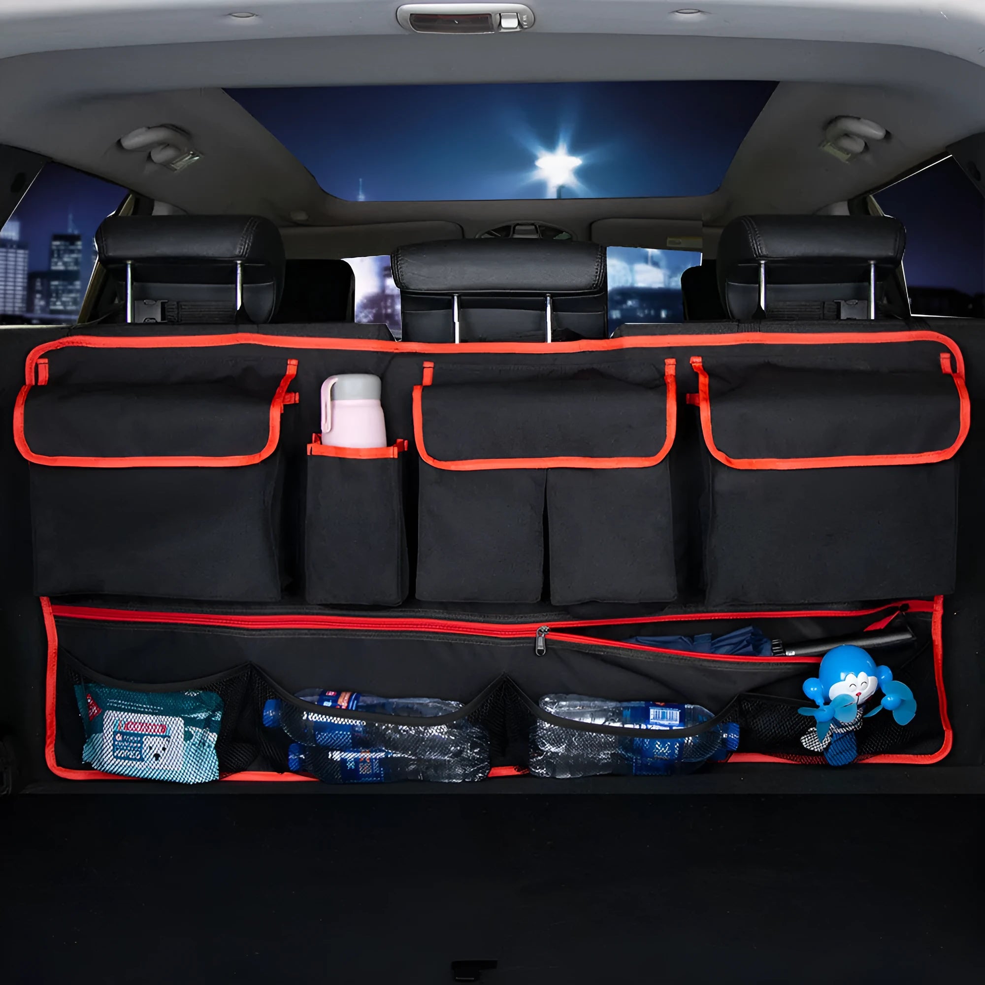 Black car trunk hanging storage organiser with handle made from waterproof Oxford cloth